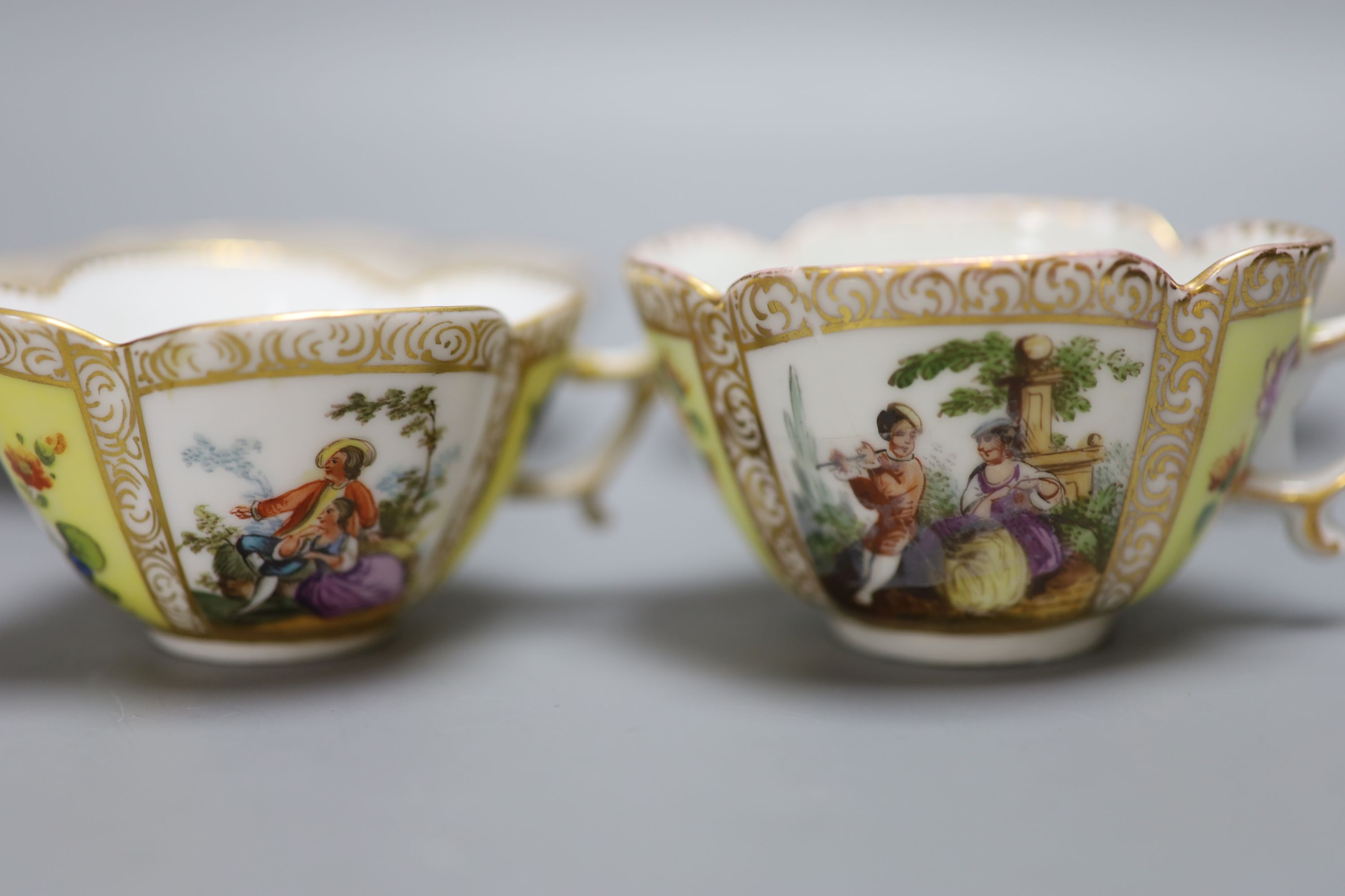 Two Dresden cups, one Dresden saucer and a Meissen saucer